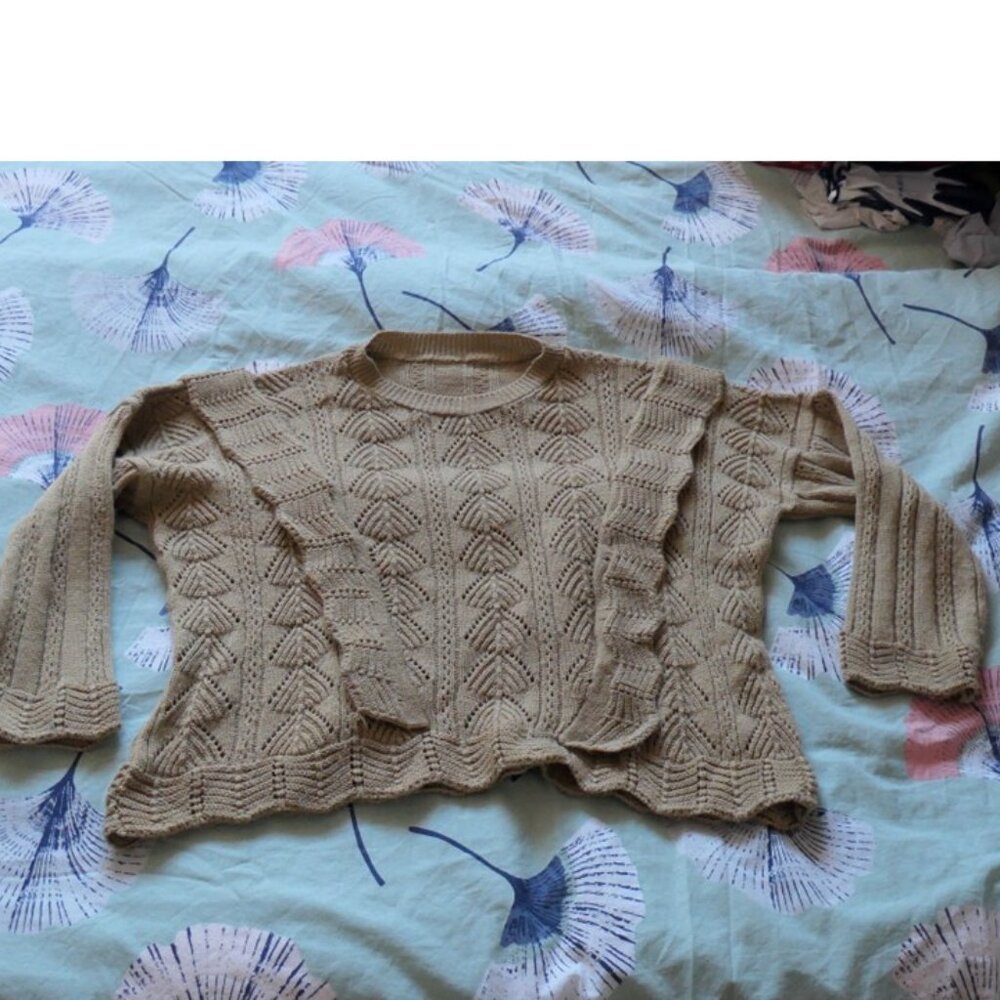 tan knit sweater with openwork and flounce  details, Small.